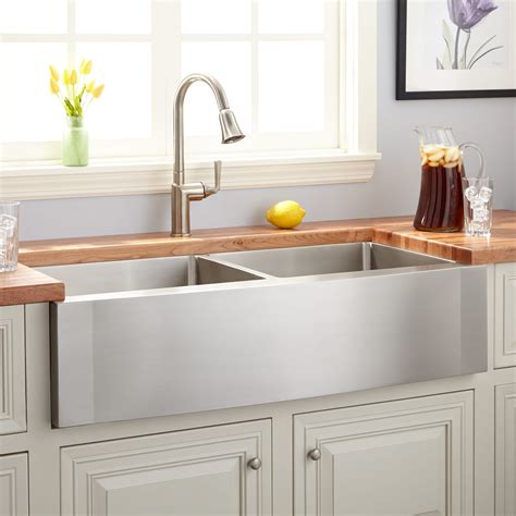 apron front stainless steel sink with white cabinets|top mount stainless farmhouse sink.